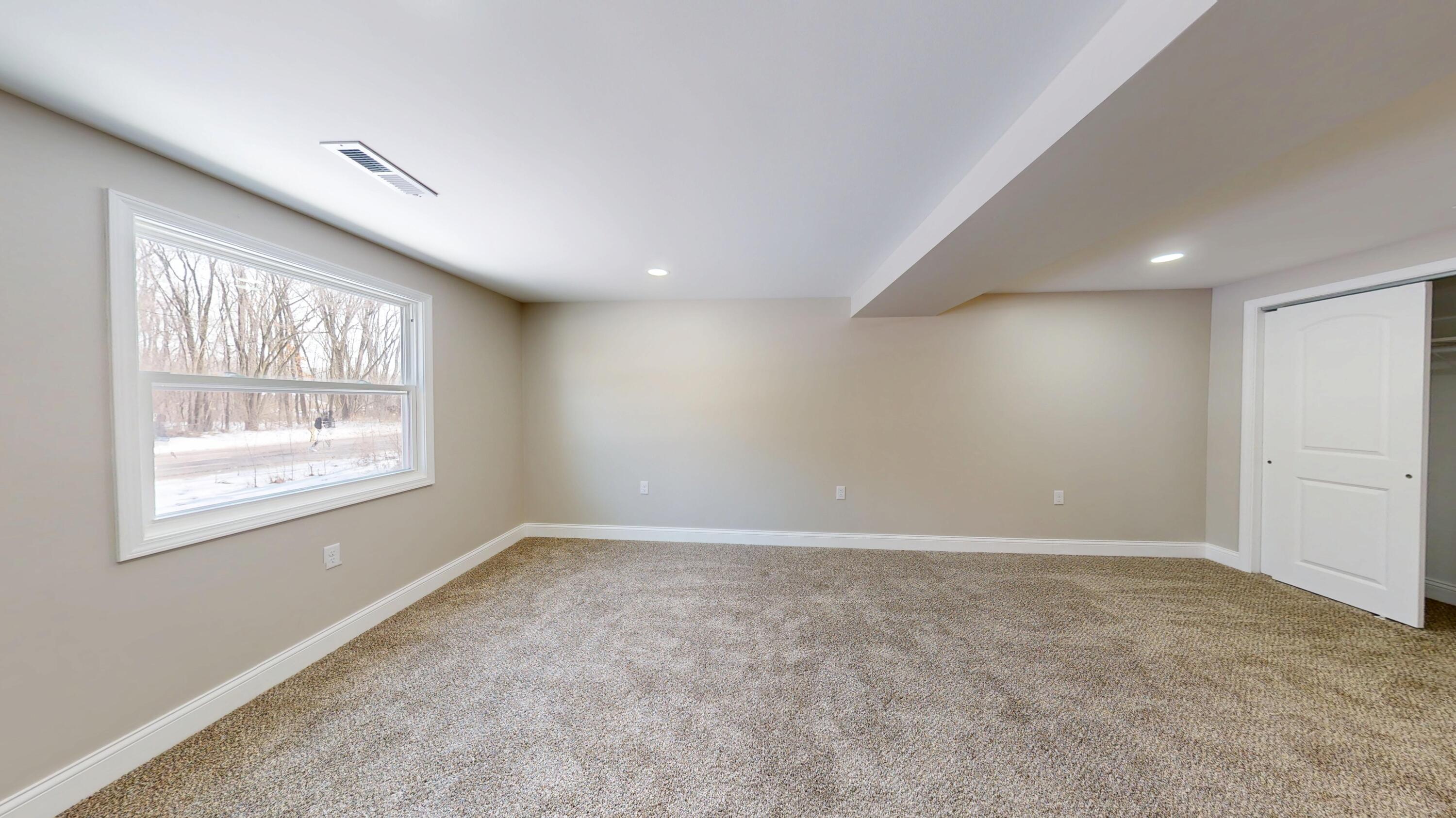 1528 Hanley Street Gary, IN 46406 - Photo 6 of 44 an empty room with windows