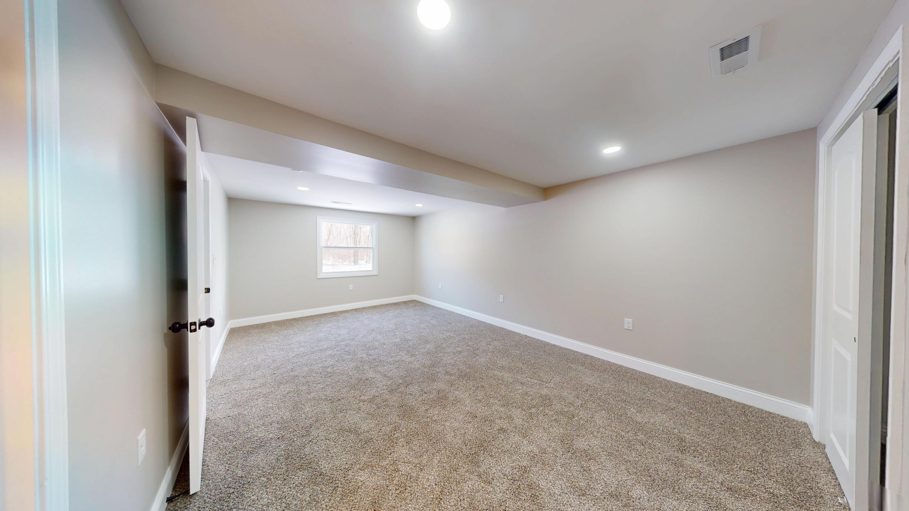 1528 Hanley Street Gary, IN 46406 - Photo 10 of 44 an empty room with a empty space and windows
