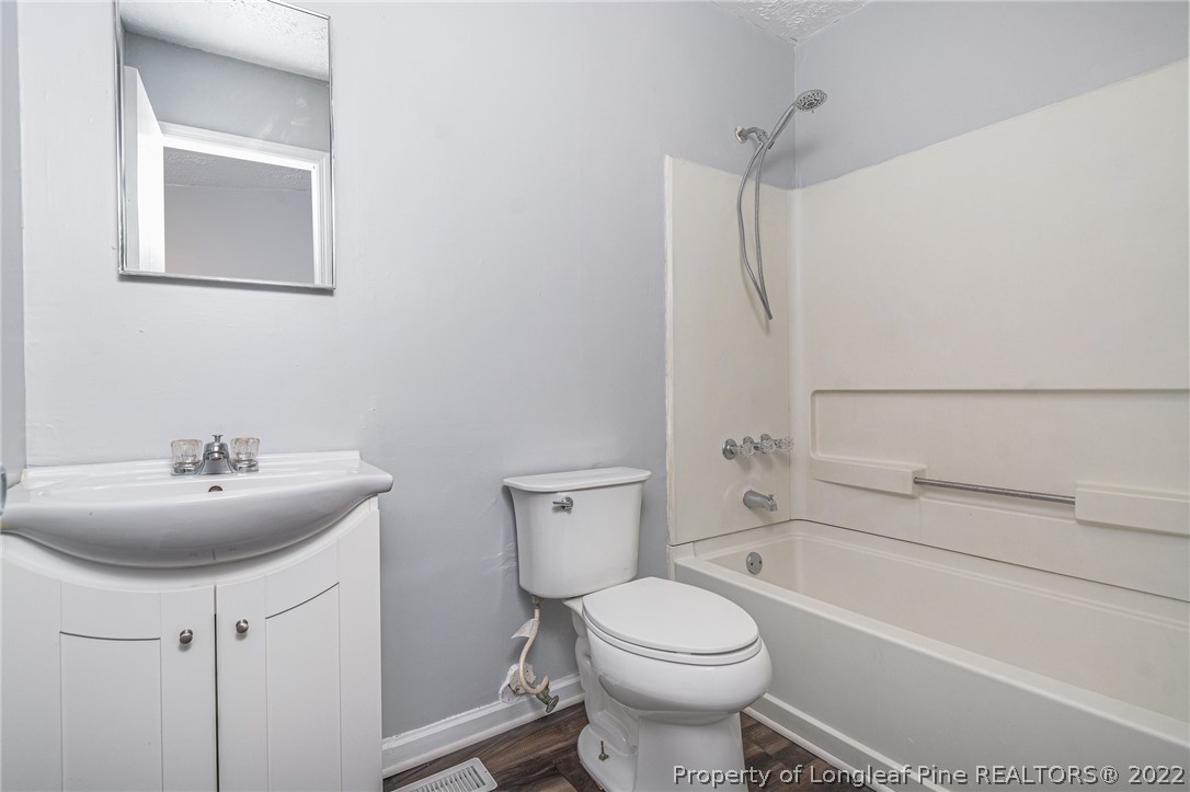 25627 Harris Road Marston, NC 28363 - Photo 22 of 30 a bathroom with a sink toilet and shower