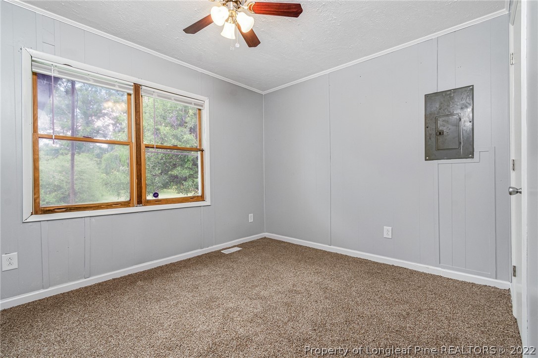 25627 Harris Road Marston, NC 28363 - Photo 23 of 30 a view of an empty room with a window