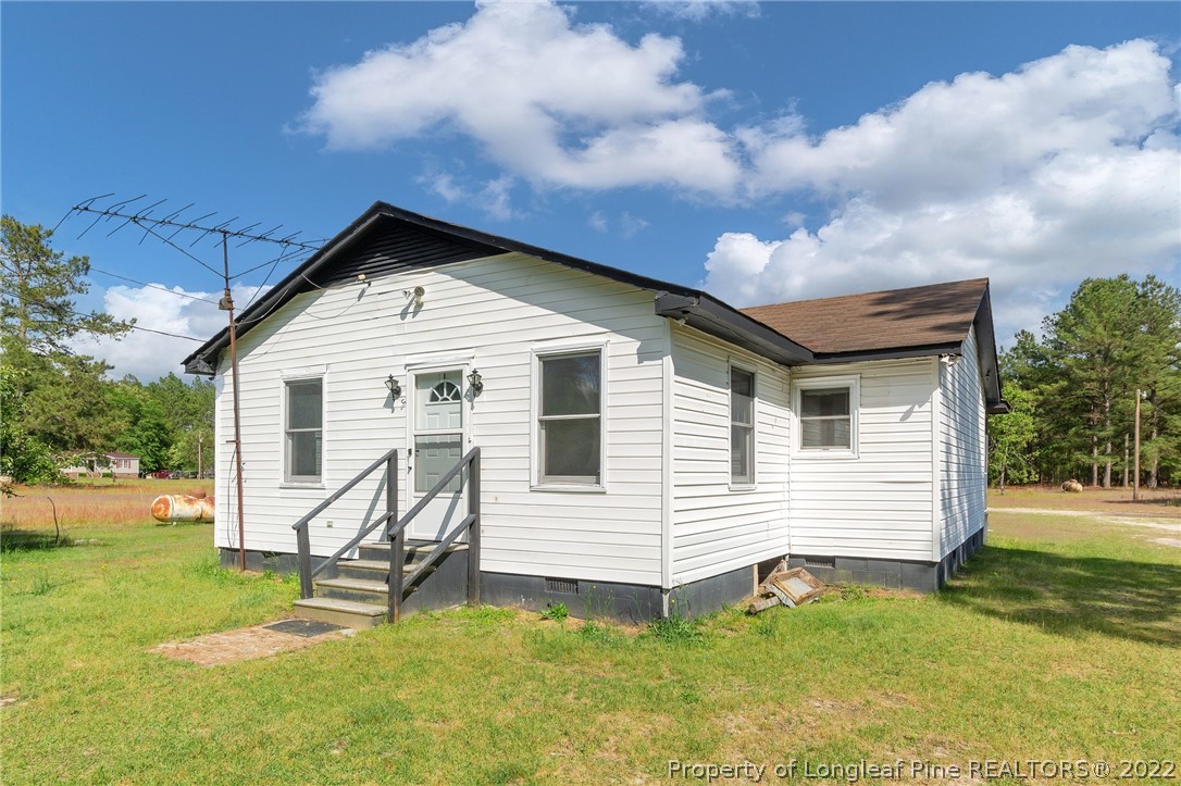 25627 Harris Road Marston, NC 28363 - Photo 29 of 30 a view of a house with a yard