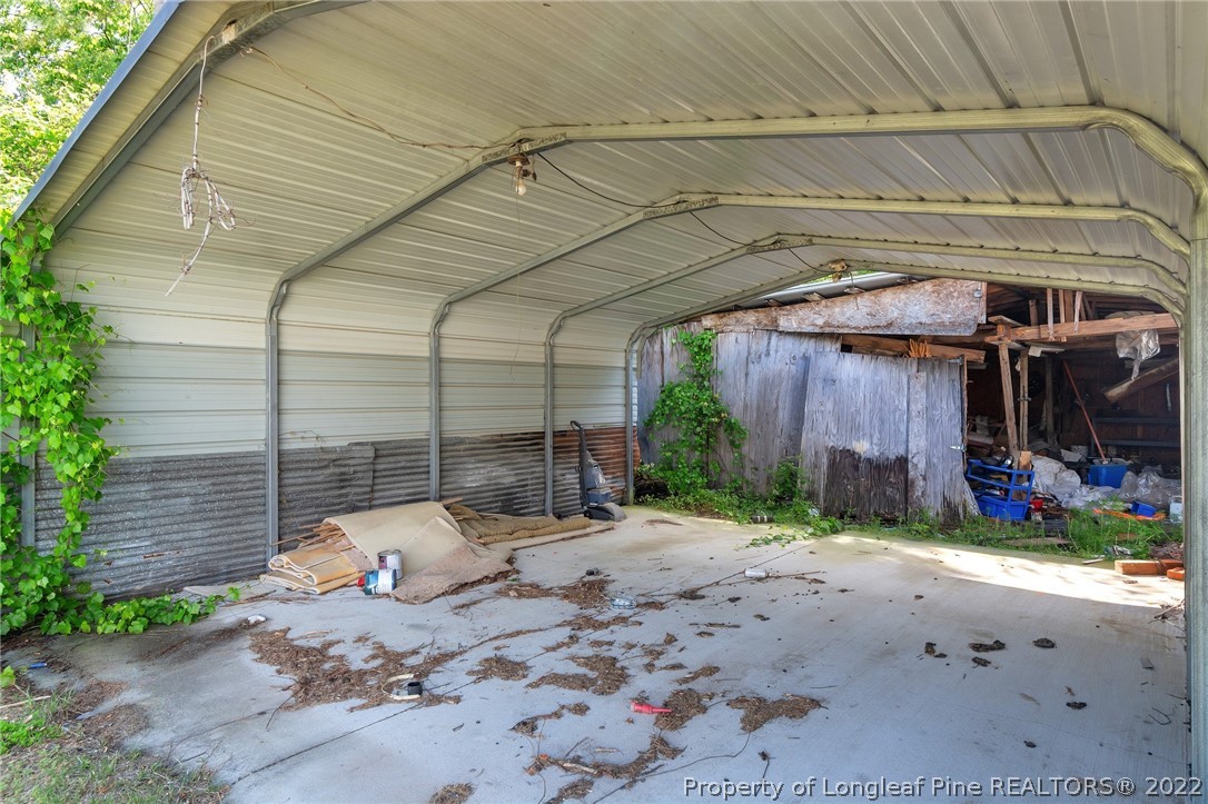 25627 Harris Road Marston, NC 28363 - Photo 30 of 30 a backyard of a house with sofas