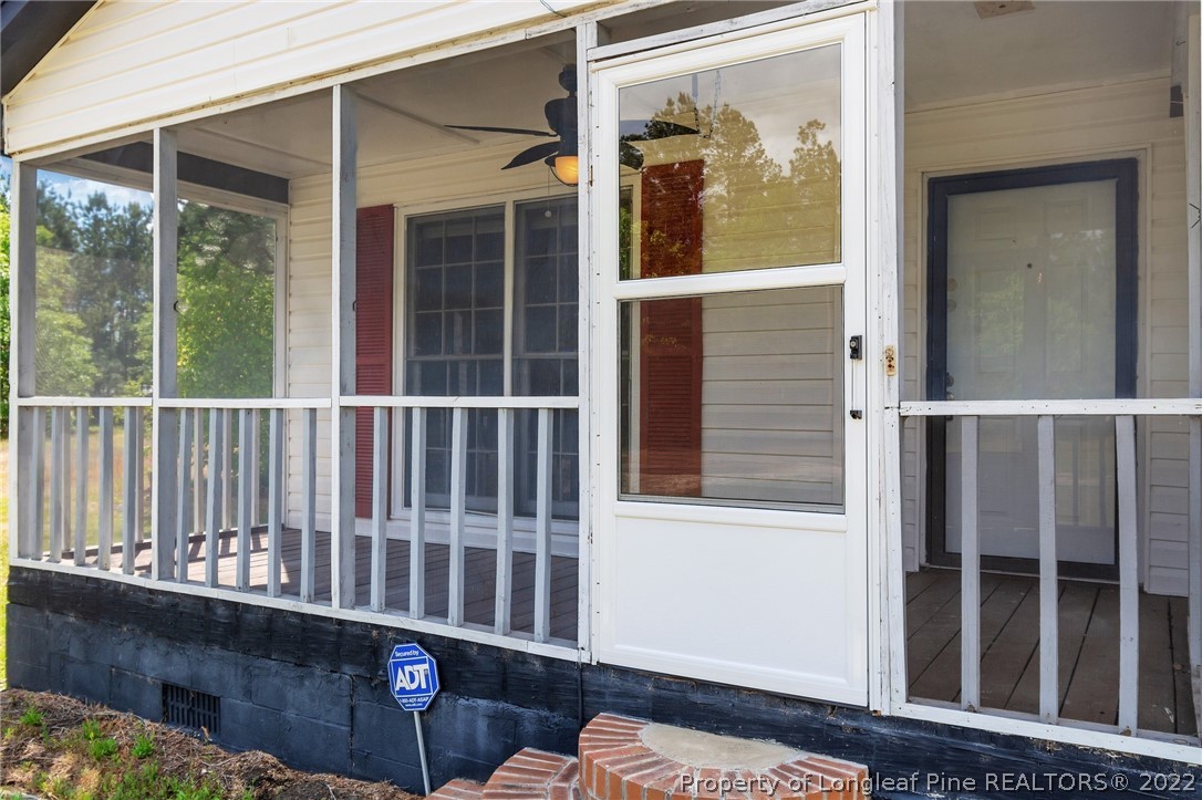 25627 Harris Road Marston, NC 28363 - Photo 4 of 30 a view of a balcony with a window
