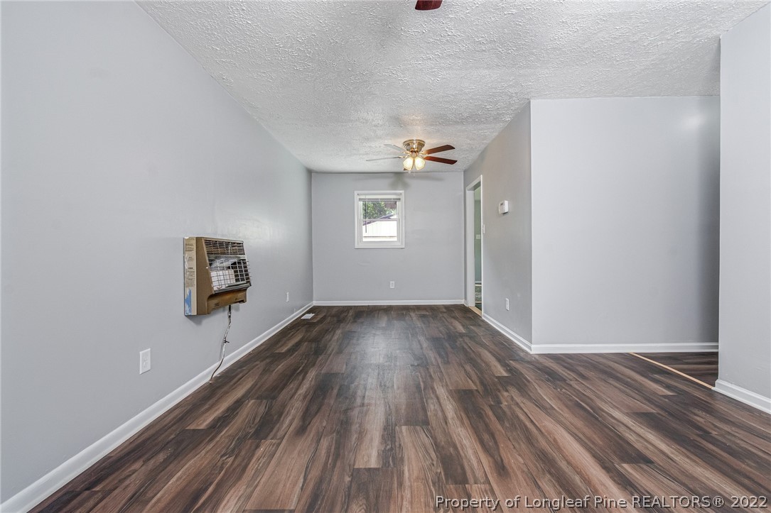 25627 Harris Road Marston, NC 28363 - Photo 7 of 30 a view of a room with wooden floor and window