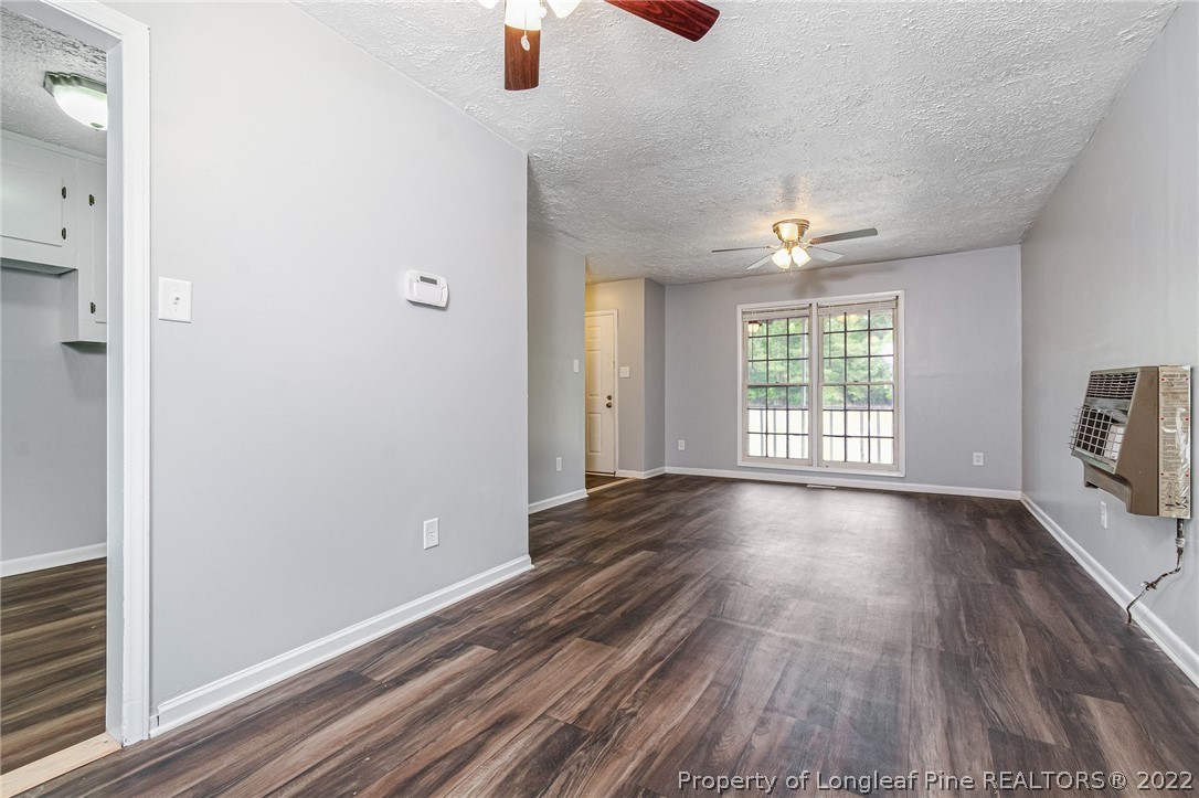 25627 Harris Road Marston, NC 28363 - Photo 8 of 30 wooden floor in an empty room with a window