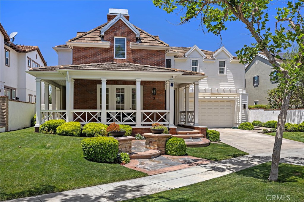 3 Tranquility Place Ladera Ranch, CA 92694 - Photo 46 of 63 a front view of a house with garden