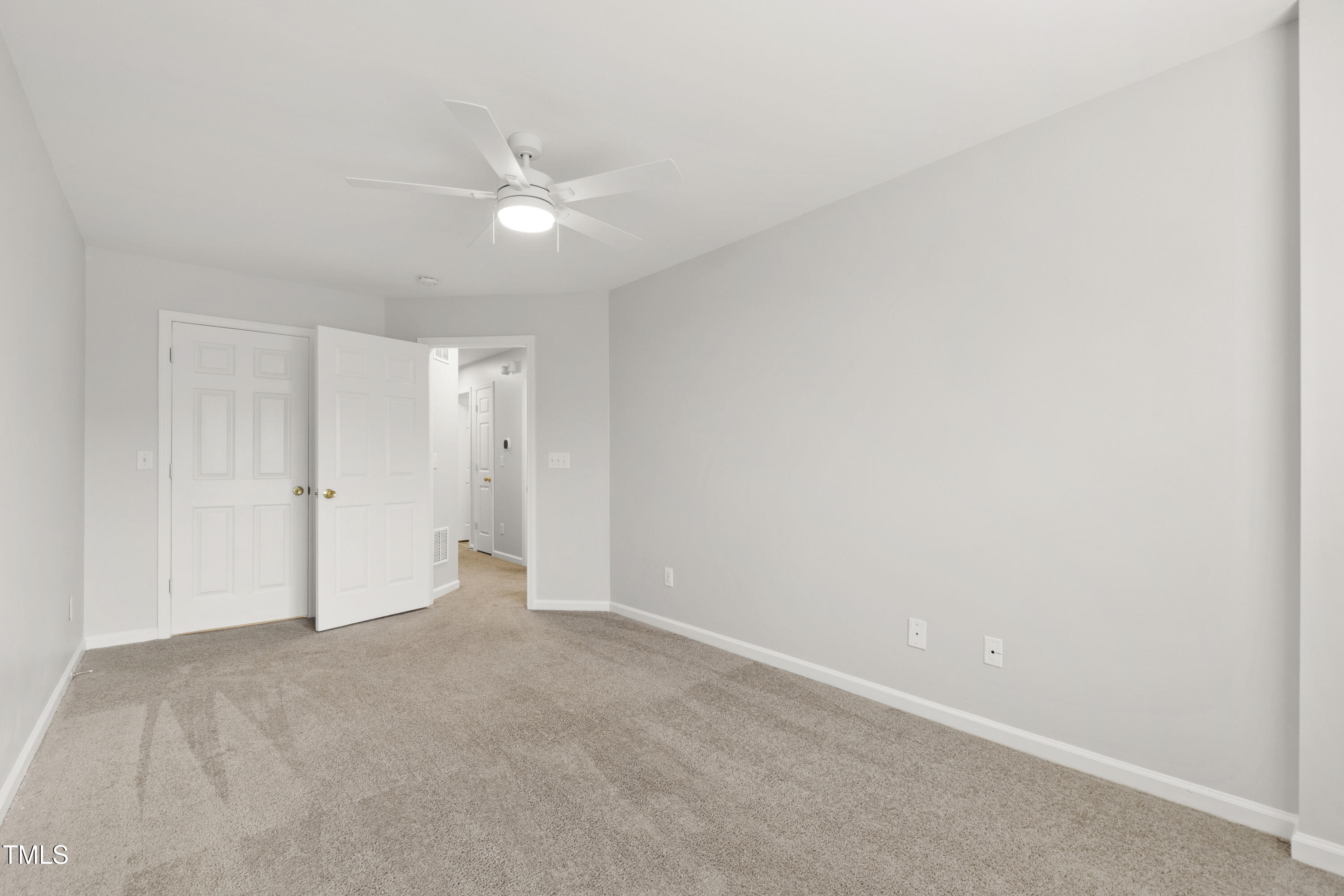 8610 Neuse Landing Lane, Unit 103 Raleigh, NC 27616 - Photo 22 of 28 a view of an empty room