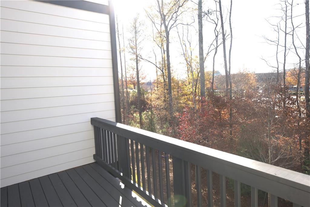 977 Catamaran Court Alpharetta, GA 30005 - Photo 13 of 39 a view of a balcony with wooden fence