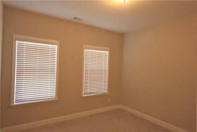 a view of a room that has a window in it