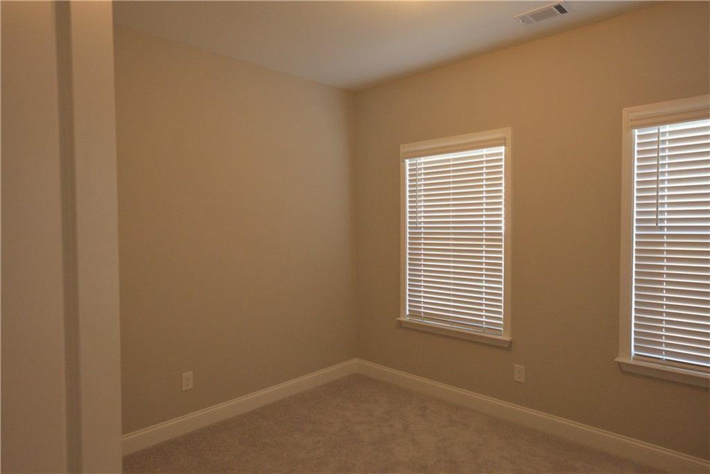 977 Catamaran Court Alpharetta, GA 30005 - Photo 22 of 39 a view of a room that has a window in it