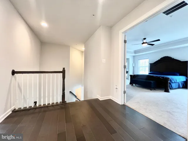 a view of a livingroom with furniture and an entryway