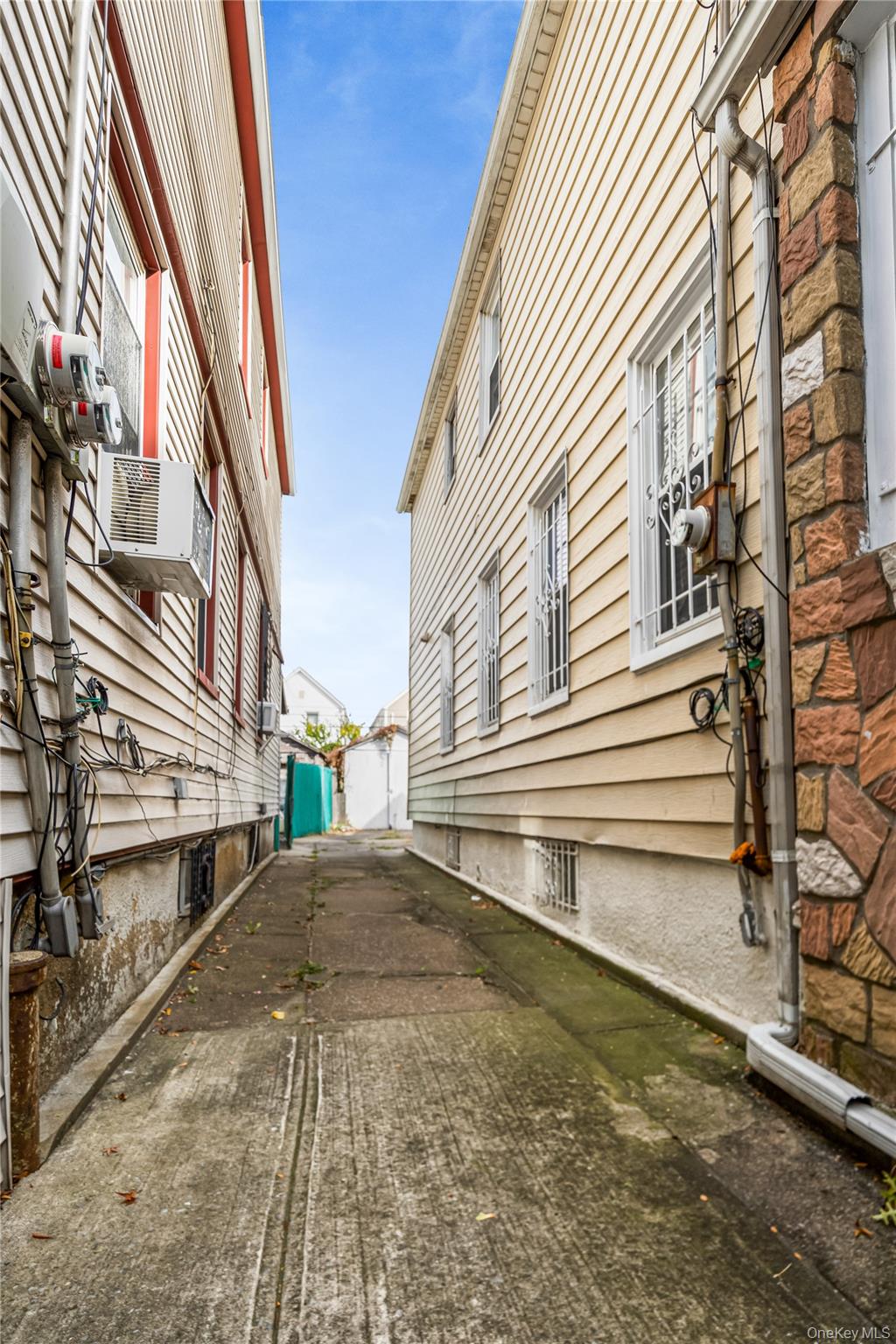 104-37 125th Street Queens, NY 11419 - Photo 21 of 24 a view of a house with a yard