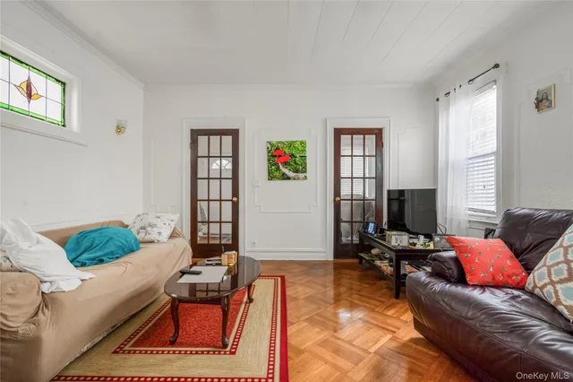 a living room with furniture and a window