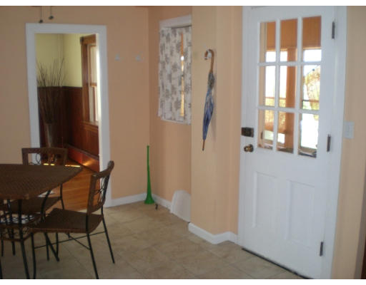 38 Edgewater Road Hull, MA 02045 - Photo 4 of 11 a view of a livingroom with furniture and a window