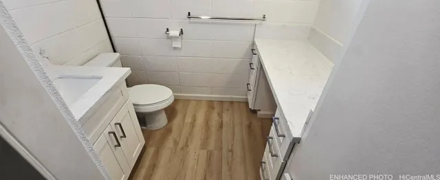 a bathroom with a sink and toilet