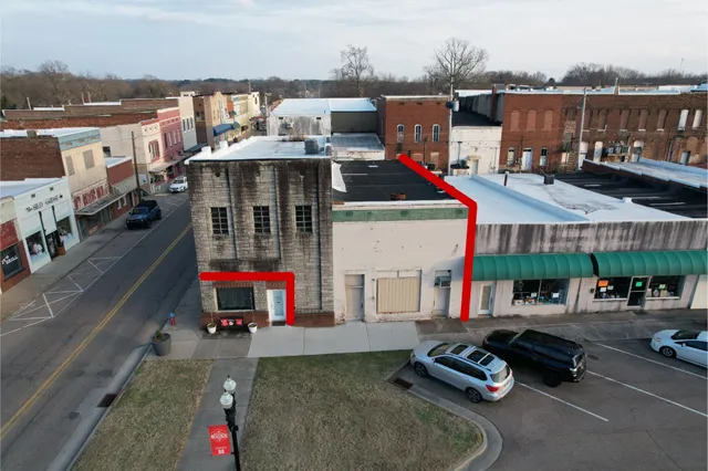 a car parked in front of a building