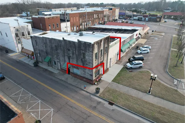 a room with furniture and air hockey table