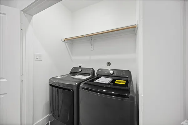 a close view of shoes stand and cabinets