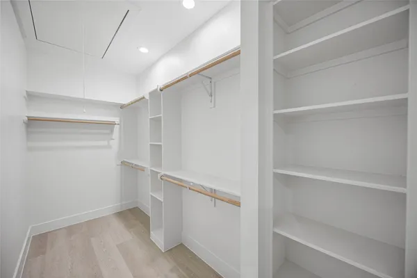 a view of an empty walk in closet