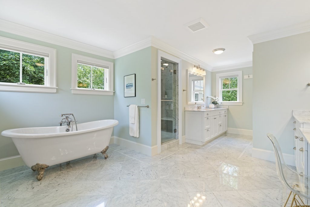 279 Emerson Road Lexington, MA 02420 - Photo 16 of 29 a spacious bathroom with a bathtub sink and mirror