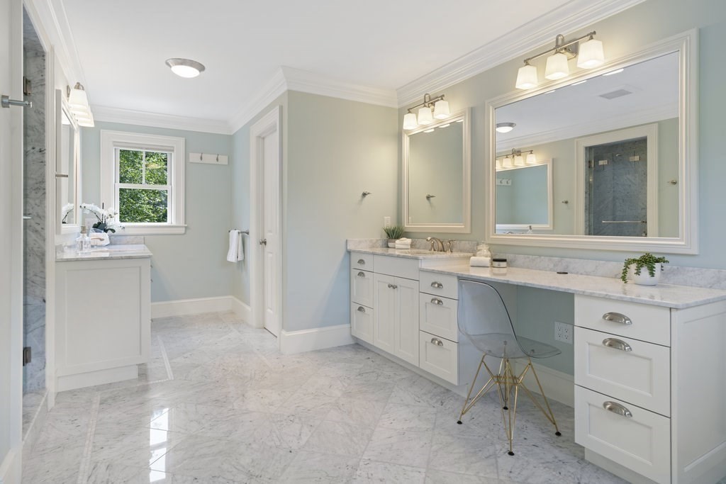 279 Emerson Road Lexington, MA 02420 - Photo 17 of 29 a spacious bathroom with a double vanity sink mirror and a