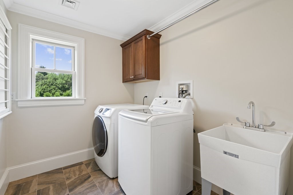 279 Emerson Road Lexington, MA 02420 - Photo 20 of 29 a utility room with dryer and washer