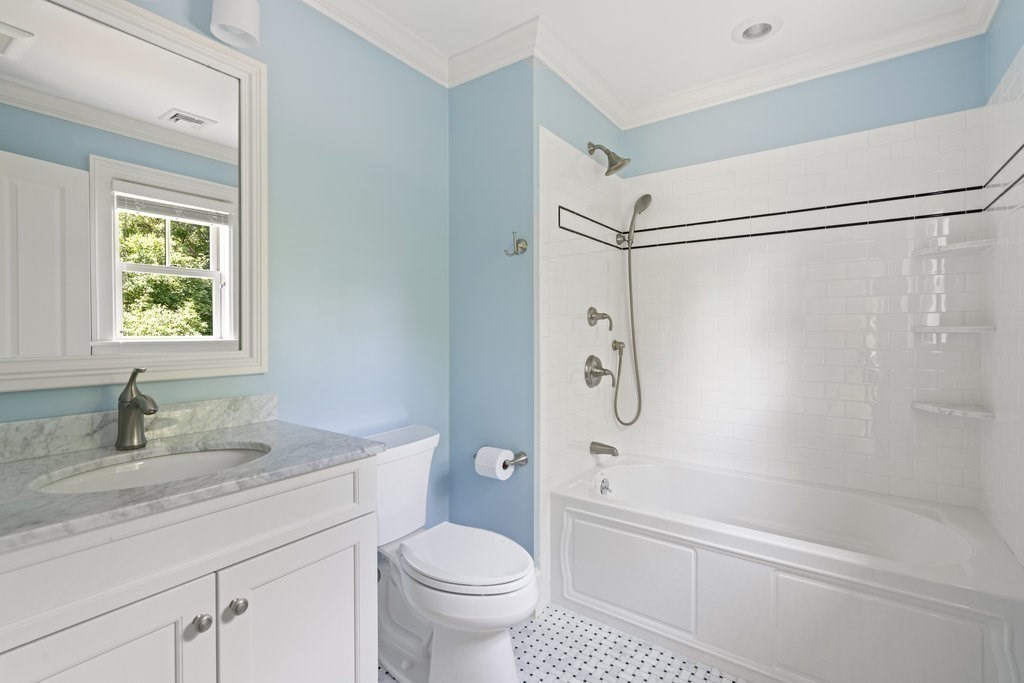 279 Emerson Road Lexington, MA 02420 - Photo 23 of 29 a bathroom with a granite countertop sink toilet and shower