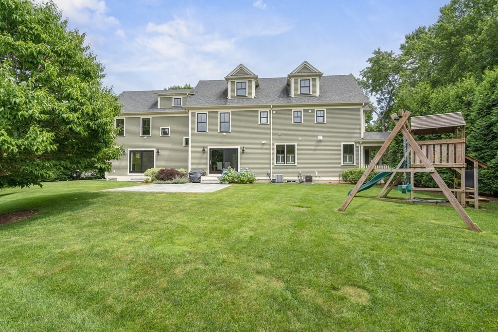 279 Emerson Road Lexington, MA 02420 - Photo 28 of 29 a front view of house with yard and green space