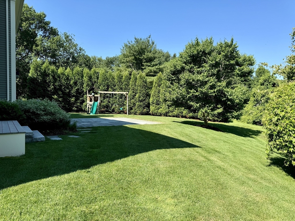 279 Emerson Road Lexington, MA 02420 - Photo 29 of 29 a view of a garden and basketball court
