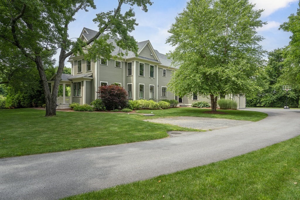 279 Emerson Road Lexington, MA 02420 - Photo 3 of 29 a front view of house with yard and green space