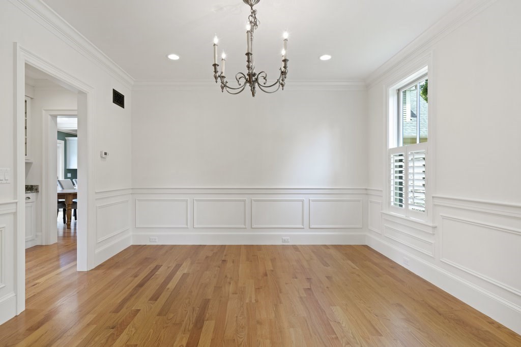 279 Emerson Road Lexington, MA 02420 - Photo 5 of 29 wooden floor in an empty room with a window
