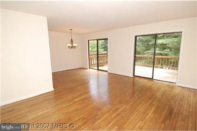 2036 Golf Course Drive Reston, VA 20191 - Photo 4 of 30 Living Room and view of Dining Room