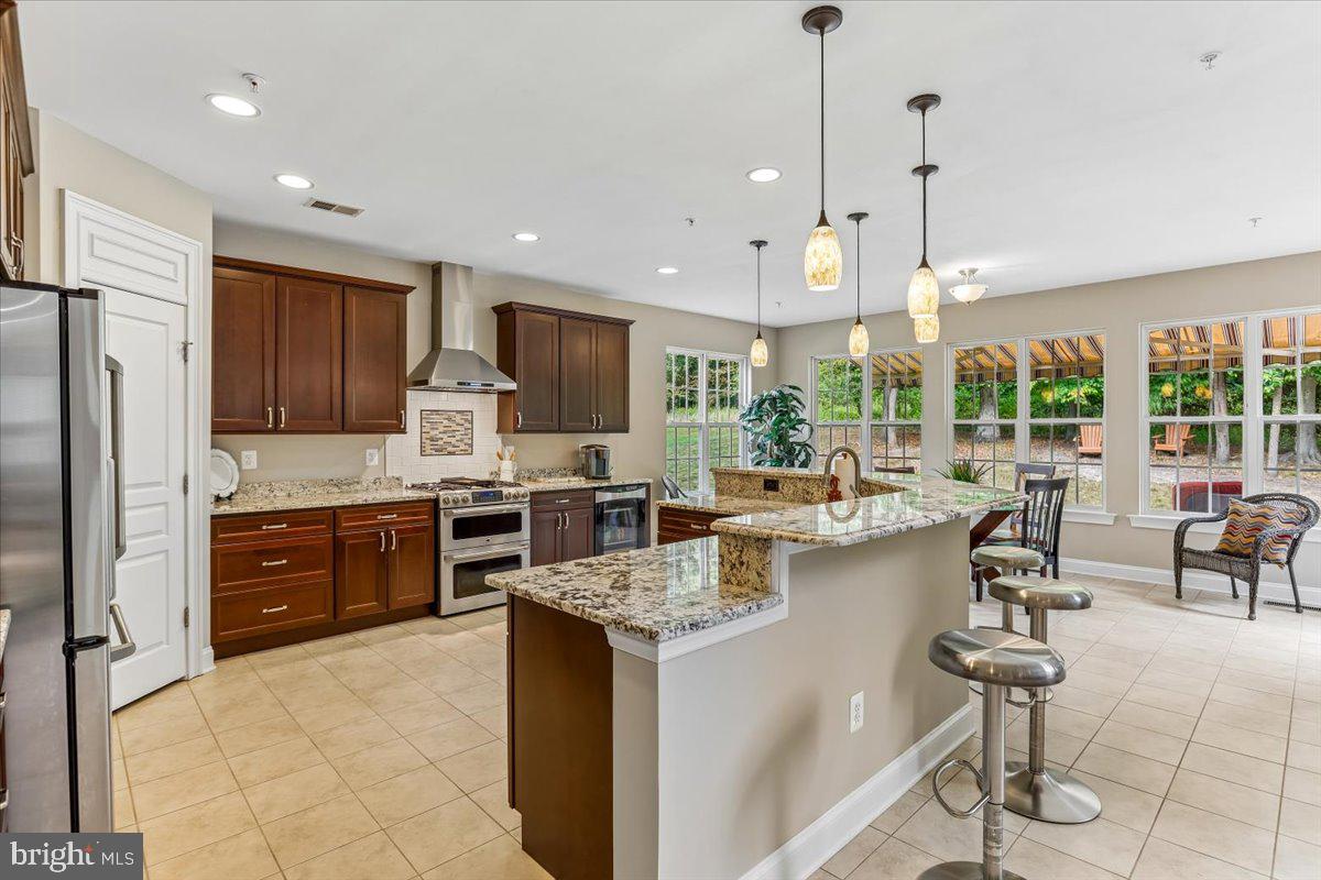 6411 Montgomery Road Elkridge, MD 21075 - Photo 3 of 40 Enormous Custom Kitchen.