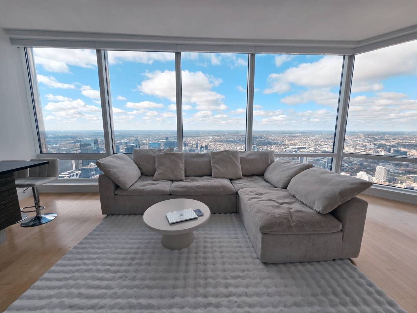 401 North Wabash Avenue, Unit 79C Chicago, IL 60611 - Photo 2 of 38 a living room with furniture and a large window