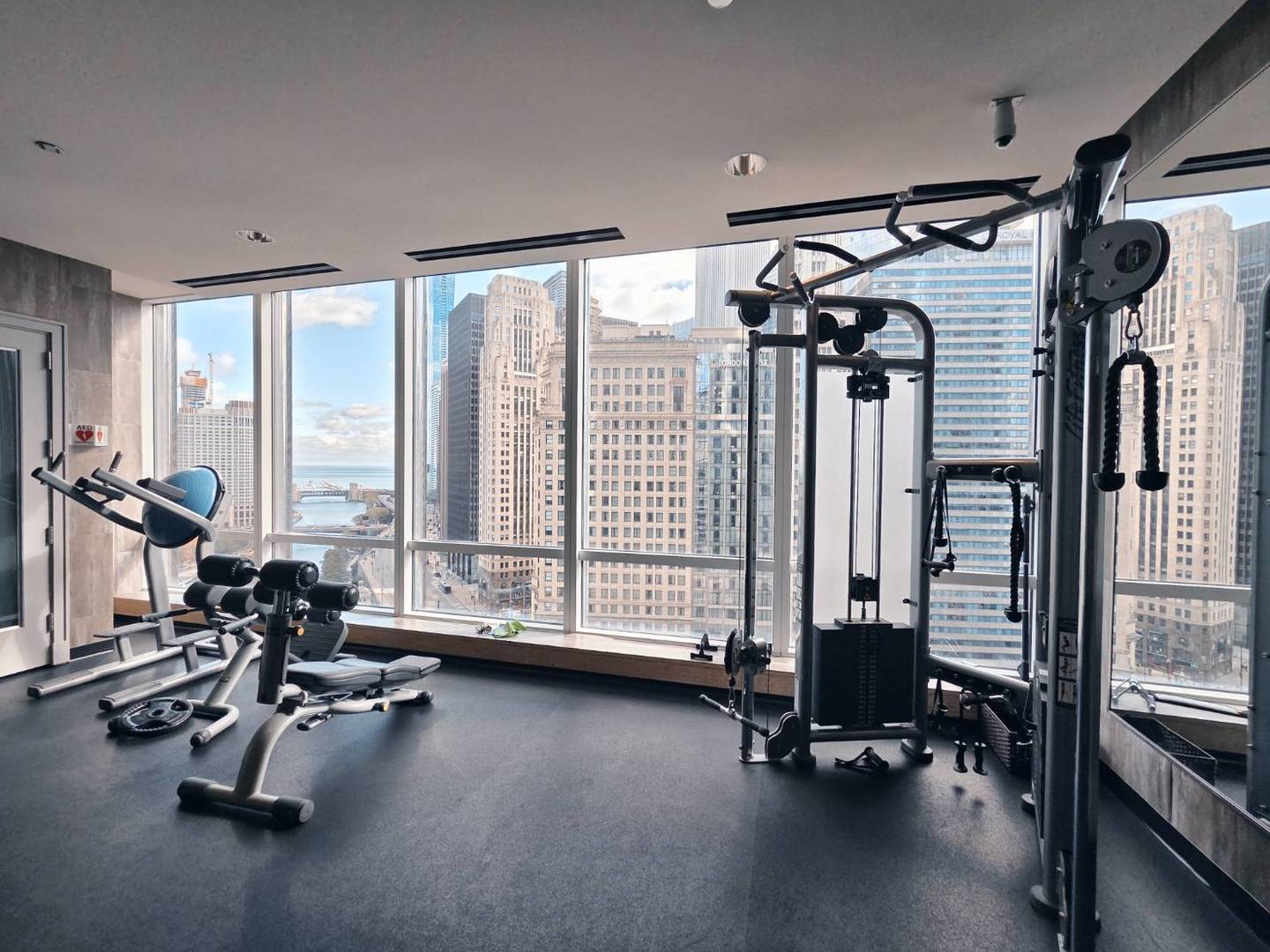 401 North Wabash Avenue, Unit 79C Chicago, IL 60611 - Photo 24 of 38 a view of a room with gym equipment