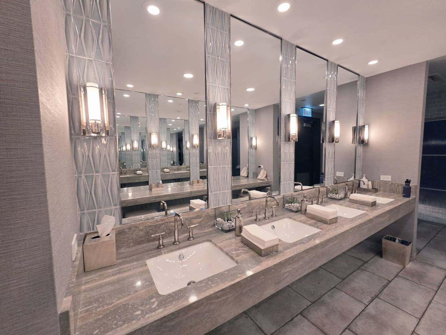 401 North Wabash Avenue, Unit 79C Chicago, IL 60611 - Photo 28 of 38 a large bathroom with a sink and mirror