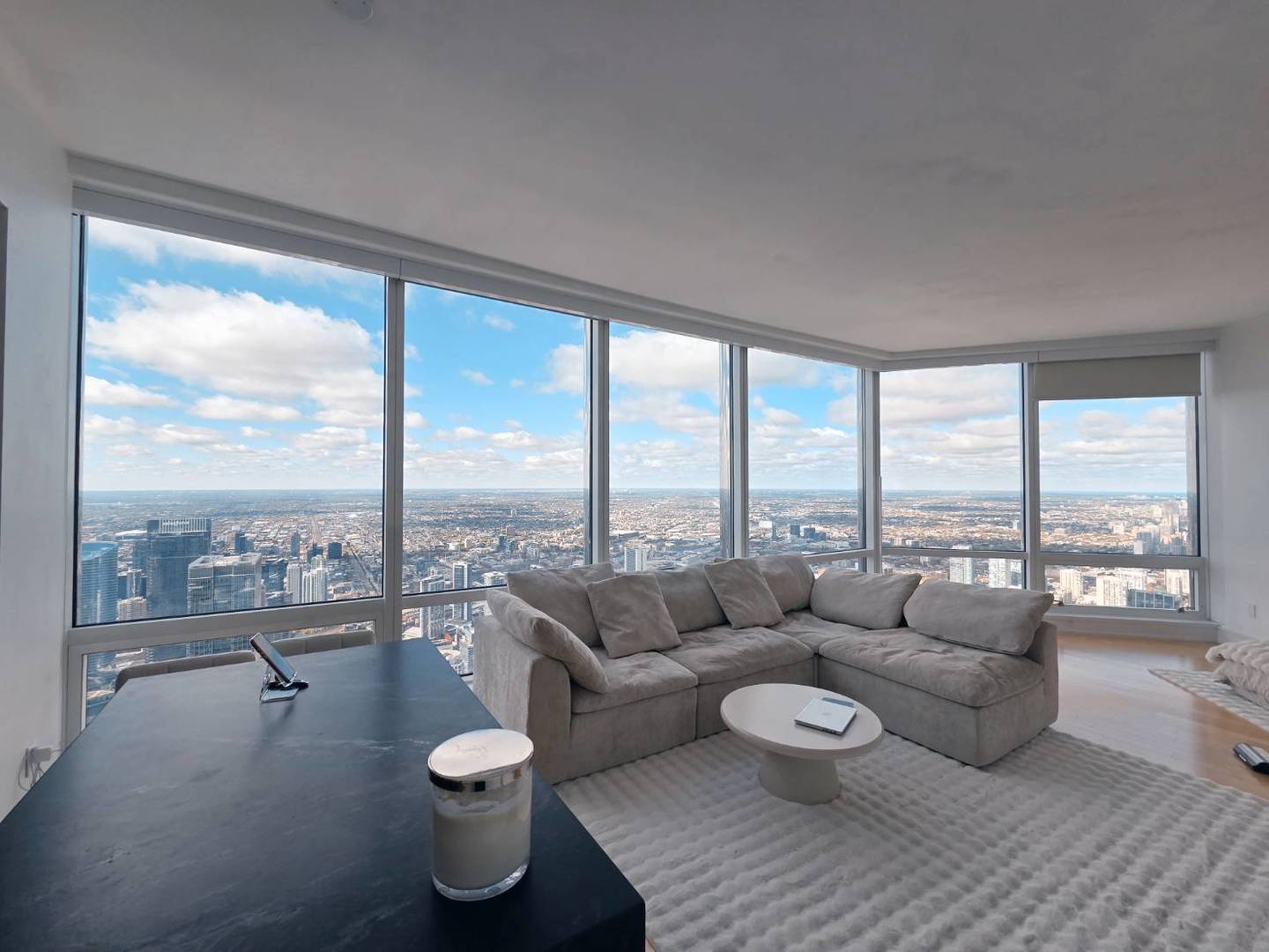 401 North Wabash Avenue, Unit 79C Chicago, IL 60611 - Photo 3 of 38 a living room with furniture and a large window