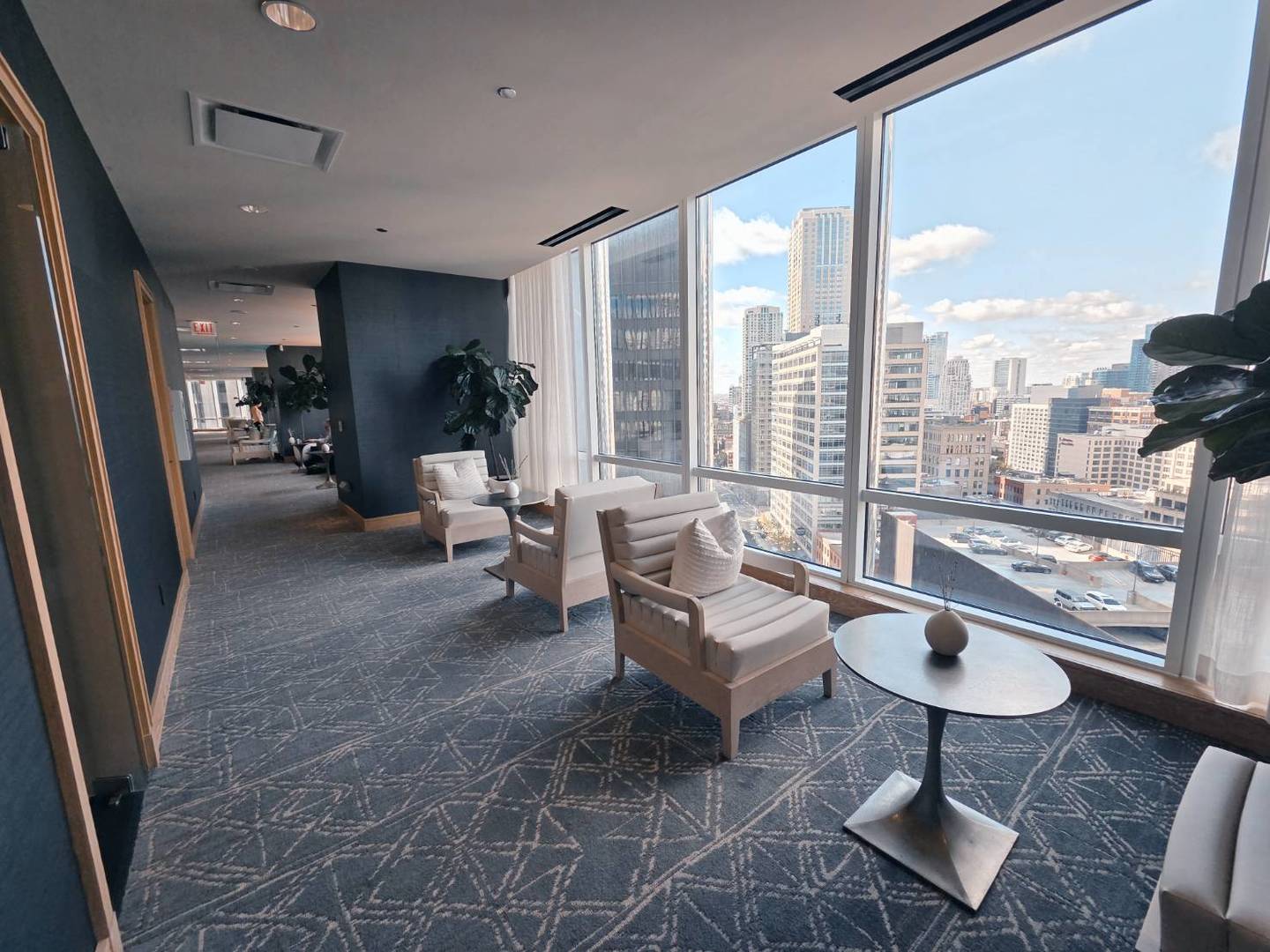 401 North Wabash Avenue, Unit 79C Chicago, IL 60611 - Photo 36 of 38 a living room with furniture and a floor to ceiling window