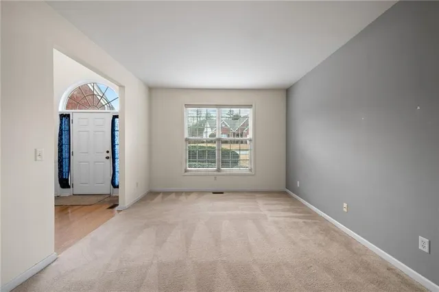 an empty room with windows