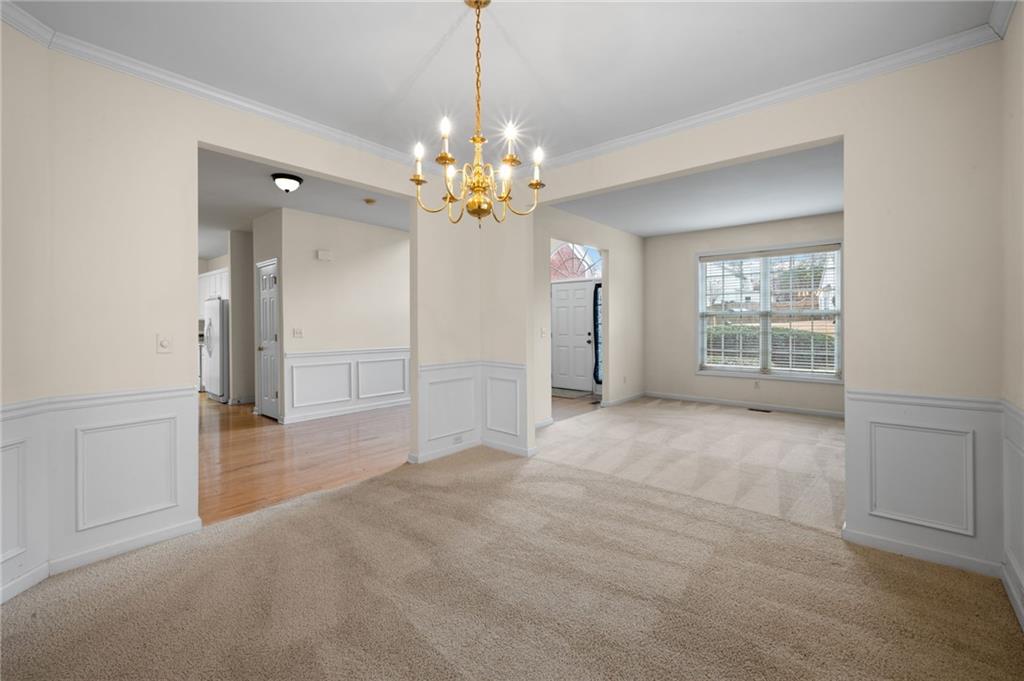 2935 Haynes Club Circle Southwest Grayson, GA 30017 - Photo 5 of 19 a view of an empty room with a window