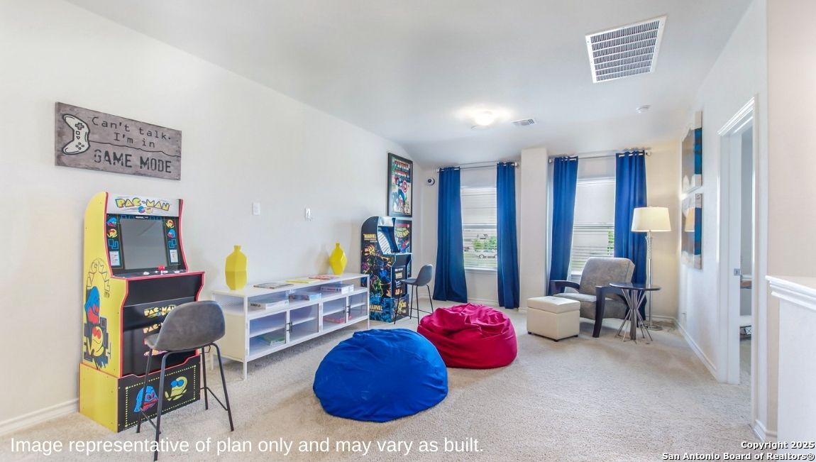 14712 Crosby Rusk San Antonio, TX 78245 - Photo 16 of 29 a room with furniture and a large window