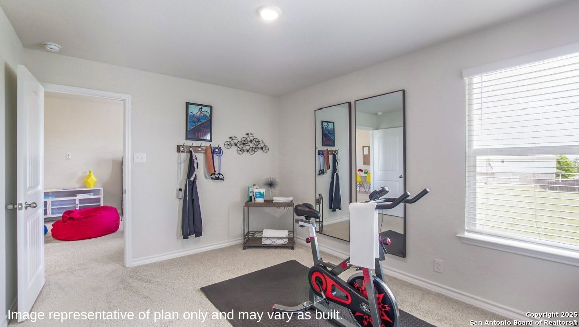 14712 Crosby Rusk San Antonio, TX 78245 - Photo 18 of 29 a living room with furniture and a window