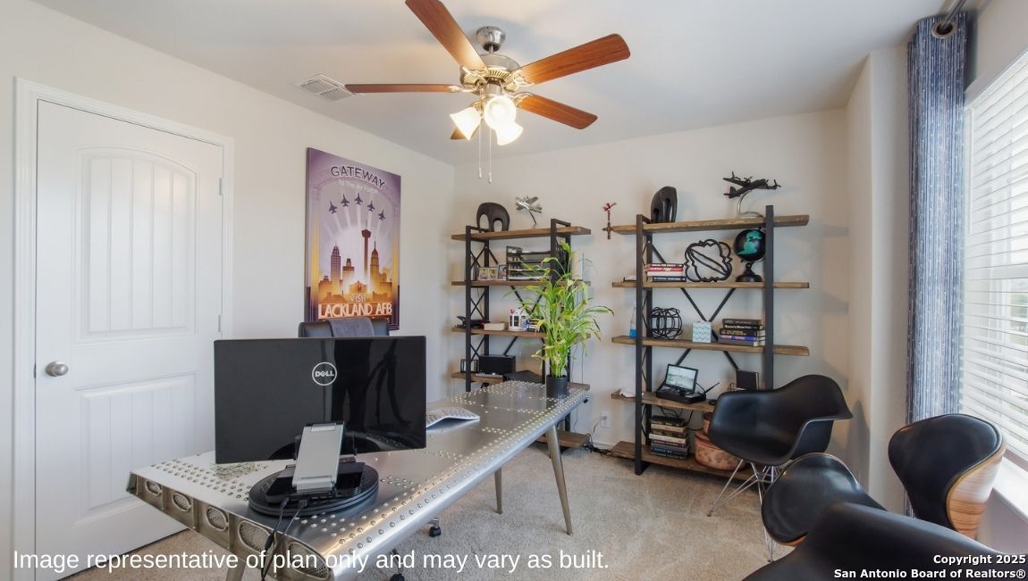 14712 Crosby Rusk San Antonio, TX 78245 - Photo 19 of 29 a work room with furniture and wooden floor