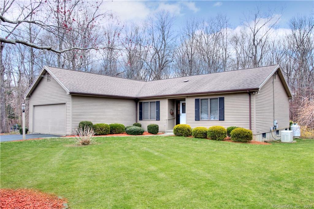 44 Forest Road Monroe, CT 06468 - Photo 1 of 1 a house view with a garden space