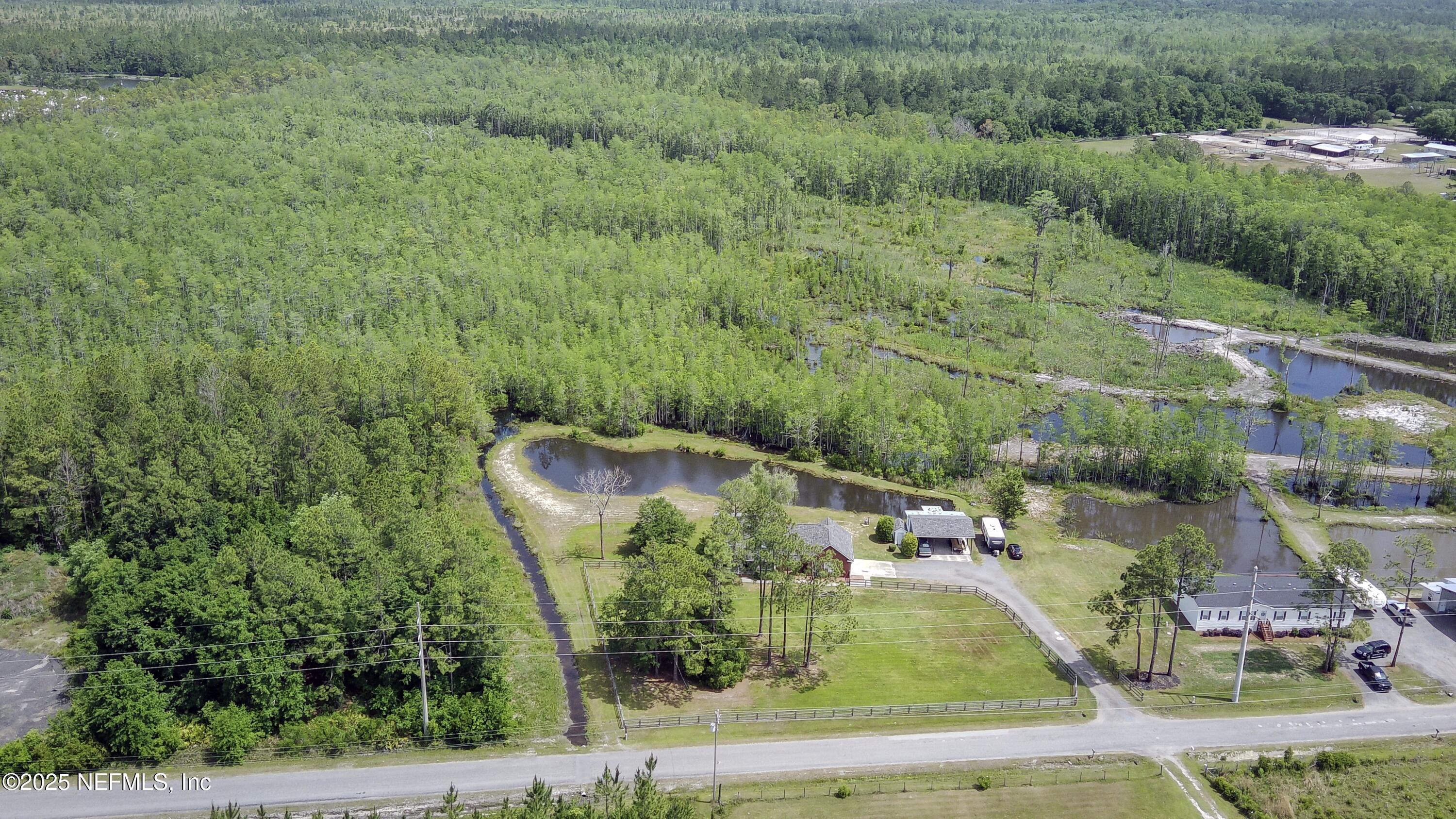 13561 Arnold Rhoden Road Glen St. Mary, FL 32040 - Photo 35 of 38 an aerial view of a house
