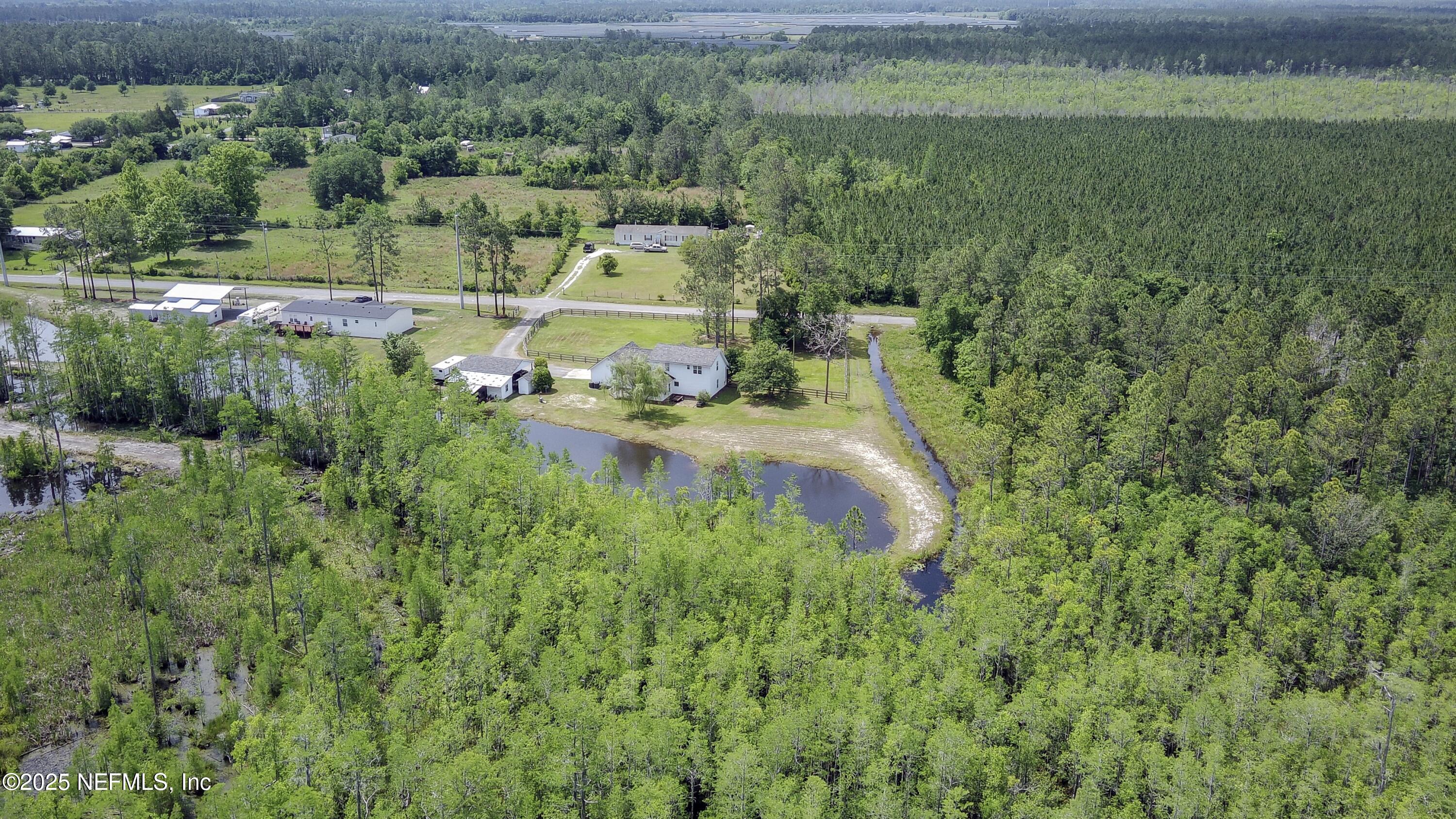 13561 Arnold Rhoden Road Glen St. Mary, FL 32040 - Photo 38 of 38 a view of a garden with a yard