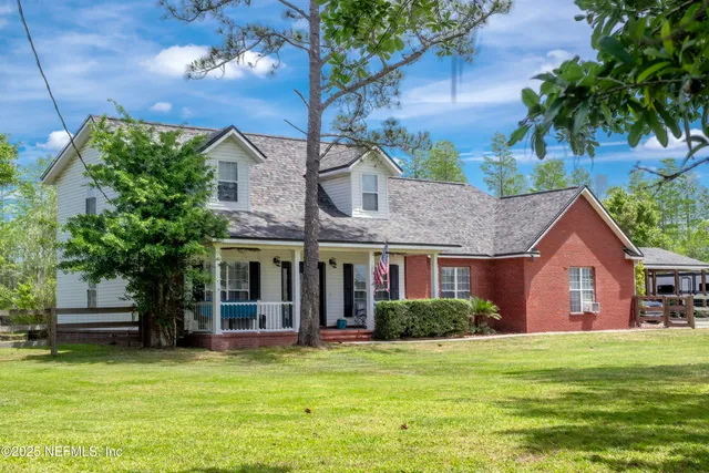a view of a house with a swimming pool