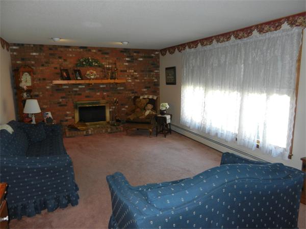25 Sagamore Road West Springfield, MA 01089 - Photo 12 of 30 a living room with furniture and a fireplace