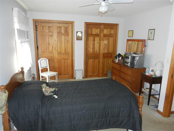 25 Sagamore Road West Springfield, MA 01089 - Photo 22 of 30 a bed sitting in a bedroom next to a window