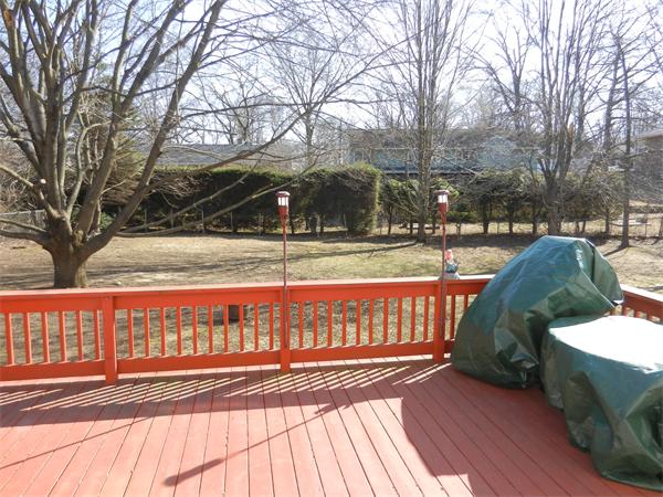 25 Sagamore Road West Springfield, MA 01089 - Photo 28 of 30 a view of a porch with wooden floor and fence next to a yard